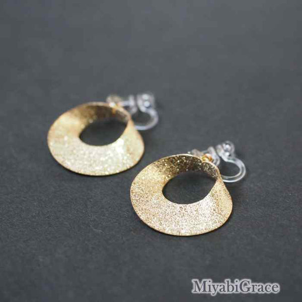 Dangle  Metallic Twisted Open Circle Invisible Clip On Earrings