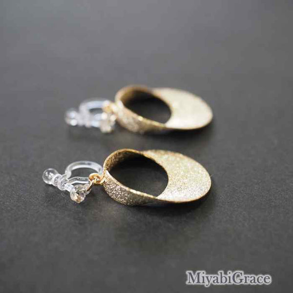 Dangle  Metallic Twisted Open Circle Invisible Clip On Earrings
