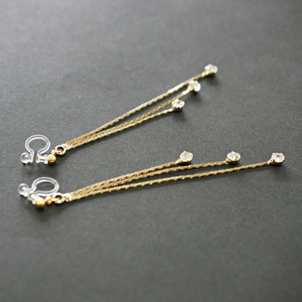 Chic Cascade Crystal Invisible Clip-On Earrings | Triple Chain Glamour