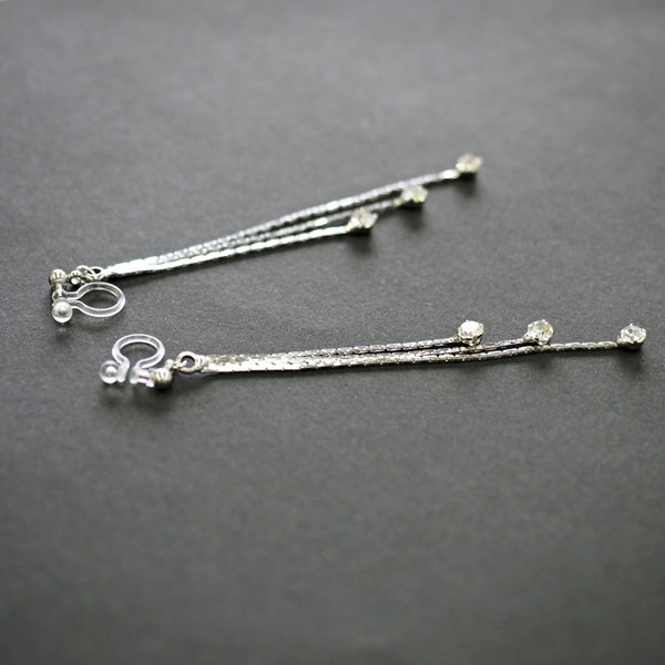Chic Cascade Crystal Invisible Clip-On Earrings | Triple Chain Glamour