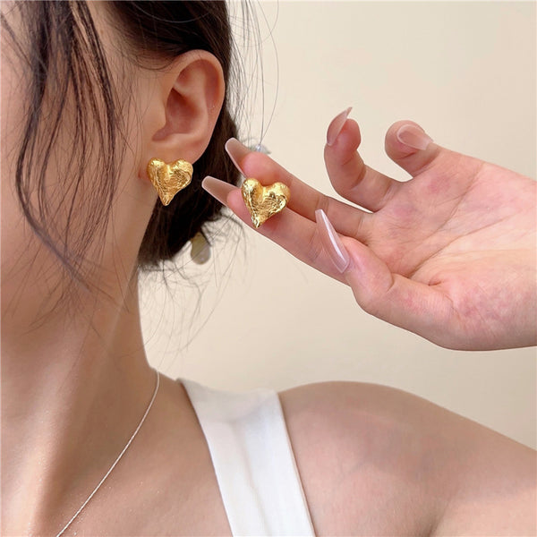 Gold Hammered Heart Coil Clip On Earrings