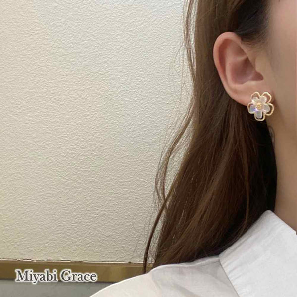 Large White Flower Coil Clip On Earrings