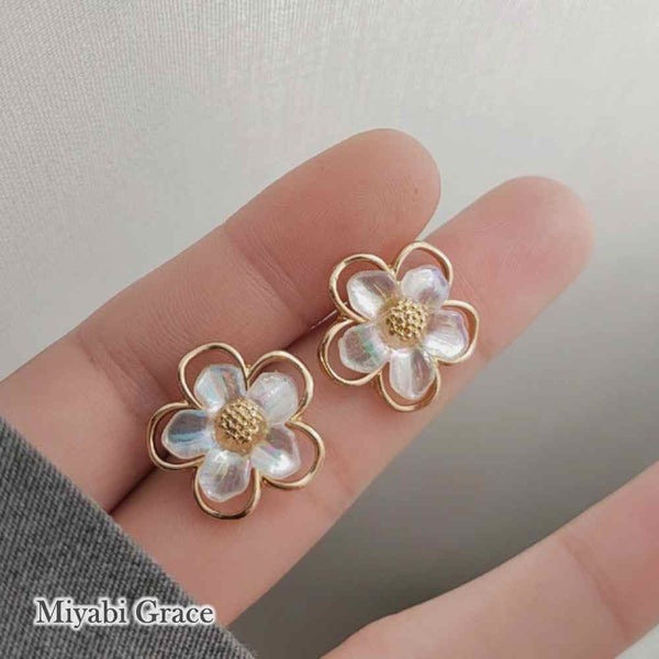 Large White Flower Coil Clip On Earrings