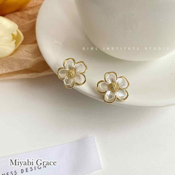 Large White Flower Coil Clip On Earrings