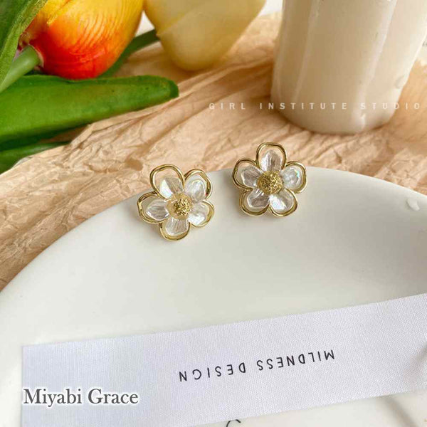 Large White Flower Coil Clip On Earrings