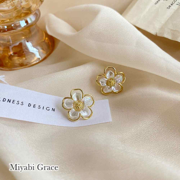 Large White Flower Coil Clip On Earrings