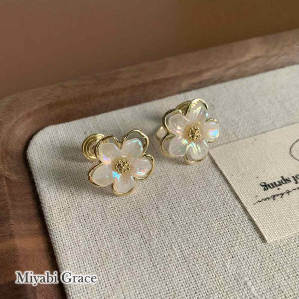 Large White Flower Coil Clip On Earrings
