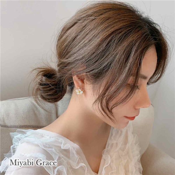Large White Flower Coil Clip On Earrings