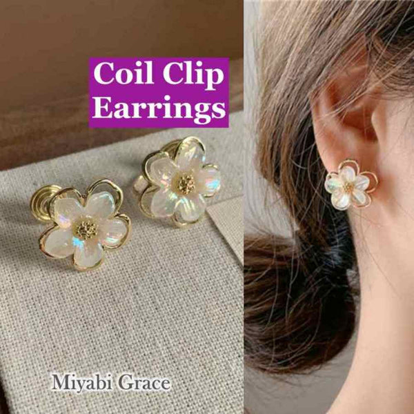 Large White Flower Coil Clip On Earrings