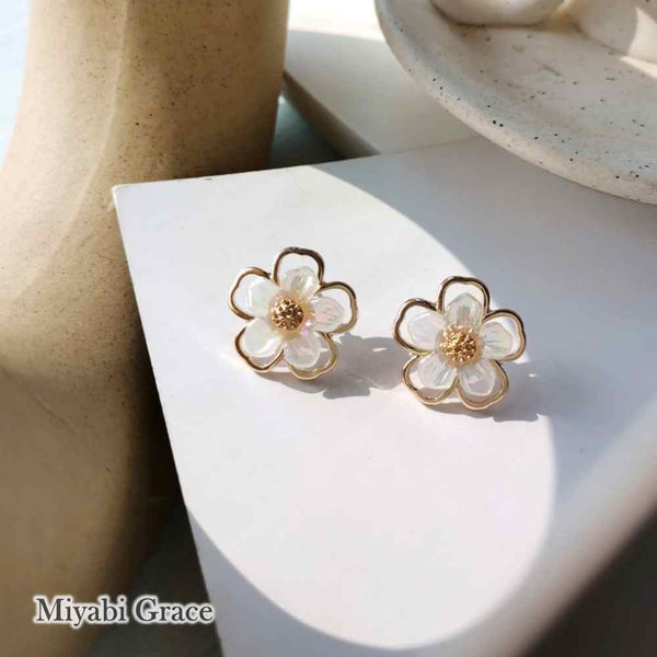 Large White Flower Coil Clip On Earrings