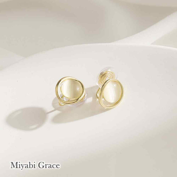 Round Beige Gold Dome Crystal Coil Clip On Earrings