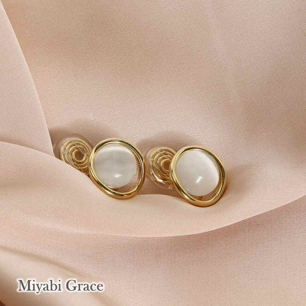 Round Beige Gold Dome Crystal Coil Clip On Earrings