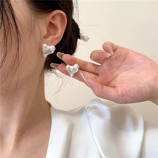 Silver Hammered Heart Coil Clip On Earrings
