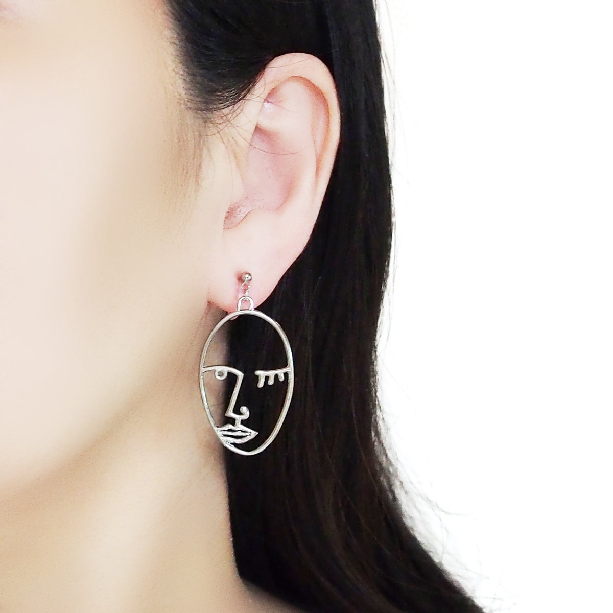 Amazing! Comfortable And Pierced Look Silver Picasso Face Wink