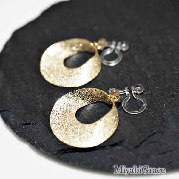 Dangle  Metallic Twisted Open Circle Invisible Clip On Earrings