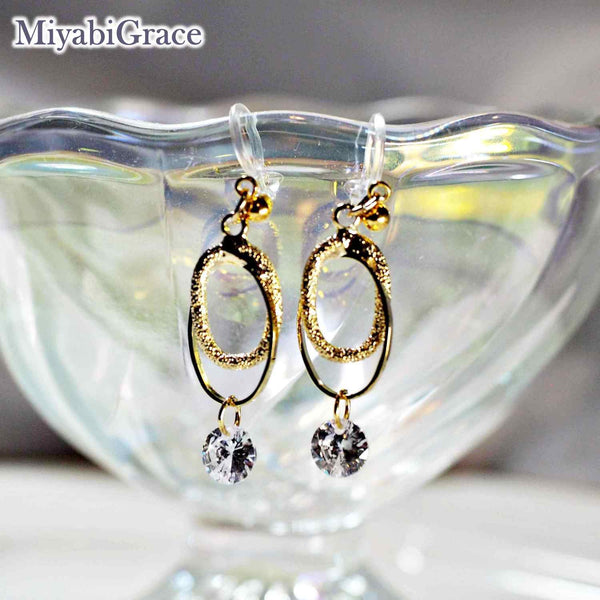 Double Oval Hoop with Cubic Zirconia Invisible Clip On Earrings