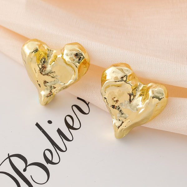 Gold Hammered Heart Coil Clip On Earrings