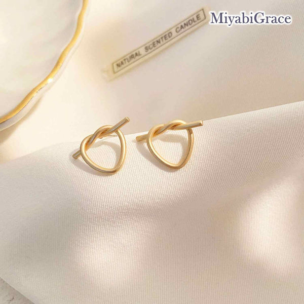 Gold Knot Heart Invisible Clip On Stud Earrings