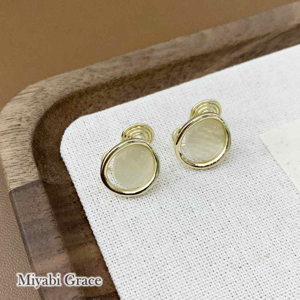 Round Beige Gold Dome Crystal Coil Clip On Earrings