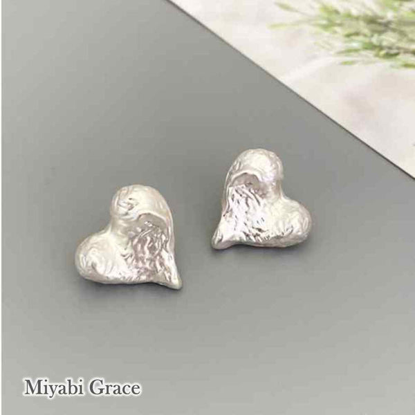Silver Hammered Heart Coil Clip On Earrings