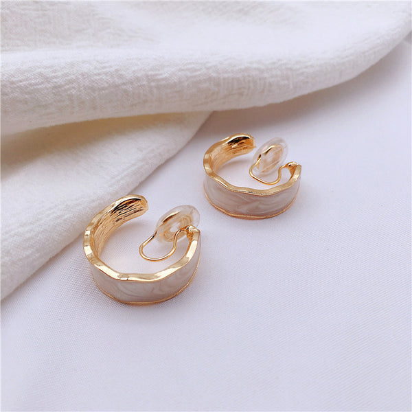 White Enamel Spiral Clip On Hoop Earrings
