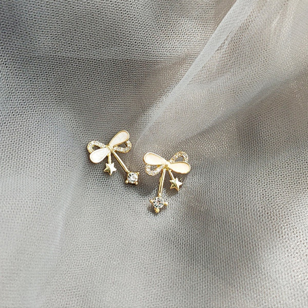 Ribbon Shaped Beige Crystal Rhinestone Bow Tie Invisible Clip On Stud Earrings