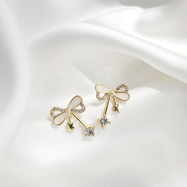 Ribbon Shaped Beige Crystal Rhinestone Bow Tie Invisible Clip On Stud Earrings