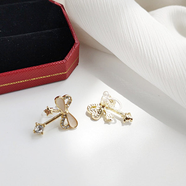 Ribbon Shaped Beige Crystal Rhinestone Bow Tie Invisible Clip On Stud Earrings